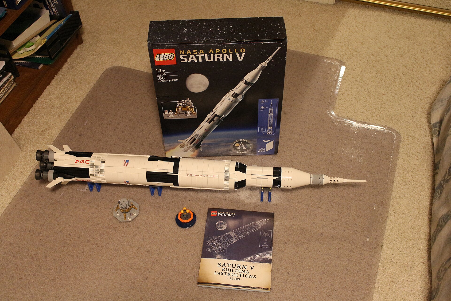 Completed LEGO Saturn V 21309 with its box and instruction manual