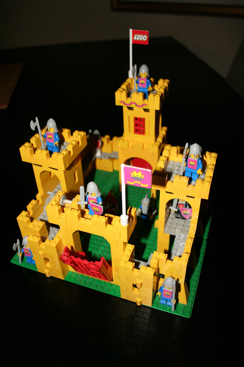 An assembled vintage yellow LEGO Castle 375
