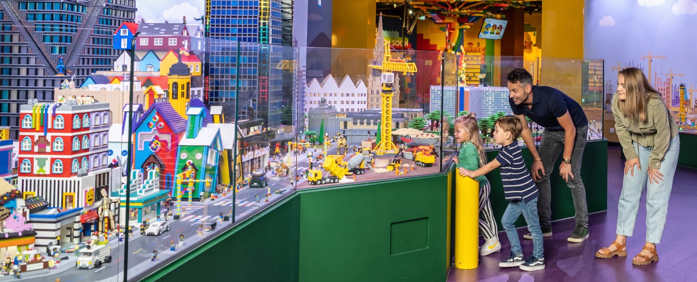 Visitors exploring Mini World at LEGO Discovery Center Brussels